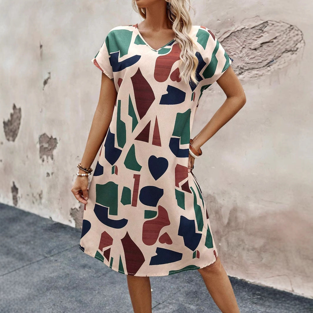 Midi Klänning med V-ringning och A-linjeform – Bekväm Polyester för Avslappnade och Festliga Tillfällen 3