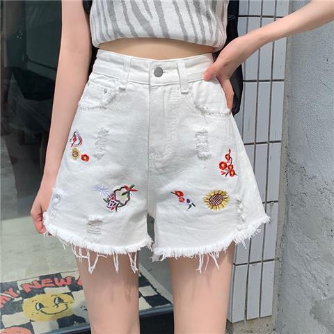Hög Midja Denim Damshorts med Löst Snitt och Unik LapptĂ€ckedesign â BekvĂ€m och Trendig för Sommaren 1