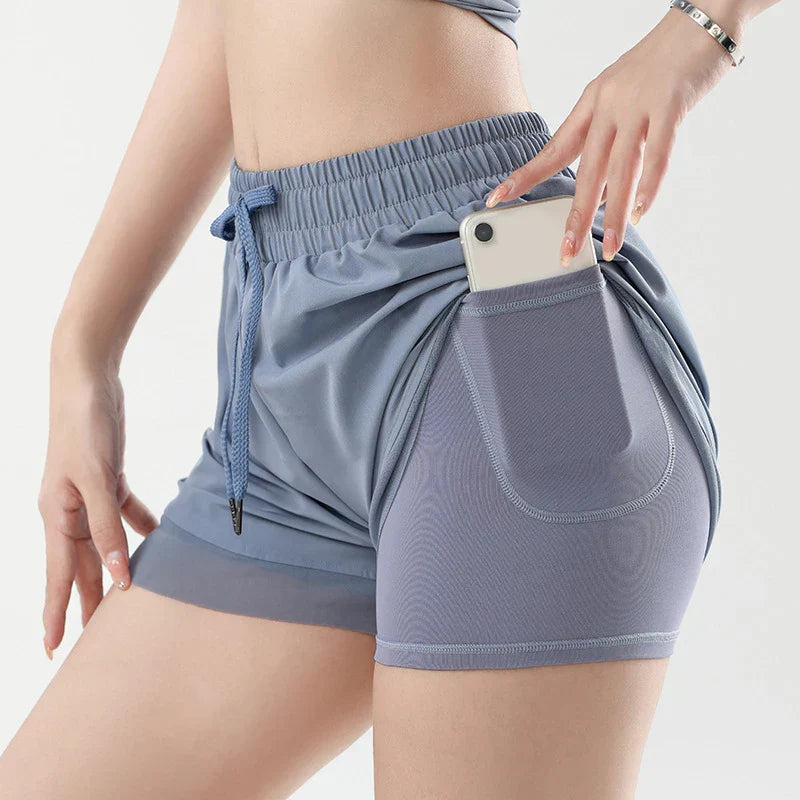 Kvinnors Sportshorts med Fickor, Elastisk Midja och Andningsbart Tyg – Lätta och Snabbtorkande För Träning och Vardag 10