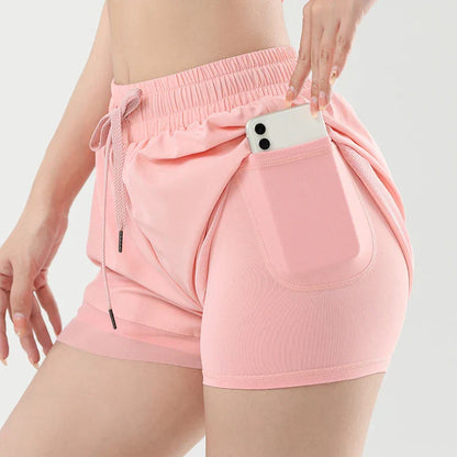 Kvinnors Sportshorts med Fickor, Elastisk Midja och Andningsbart Tyg – Lätta och Snabbtorkande För Träning och Vardag 1