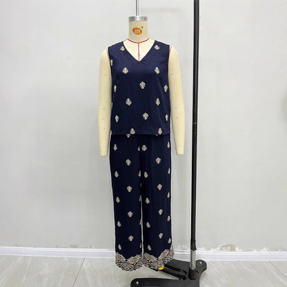 Kvinnors Tvådelad Set med V-hals, Ärmlös Topp och Bredbyxor i Lätta Tyger – Gyllene Accenter och Avslappnad Passform 4