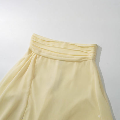 Svart Minikjol i Chiffong med Elegant Wrap-Design – Lätt och Andningsbar för Sommarfester och Kvällsevenemang 2