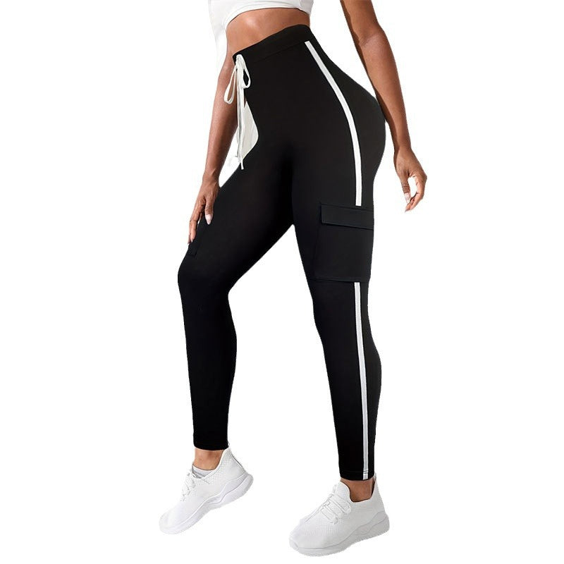 Kvinnors Sport Leggings med Sidofickor och Reflekterande Ränder – Andningsbart Tyg för Komfort och Säkerhet 6