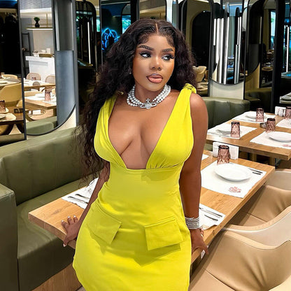 Svart Miniklänning med V-ringning och Fickor i Elastiskt Tyg – Bekväm och Elegant Klänning för Kvinnor 3