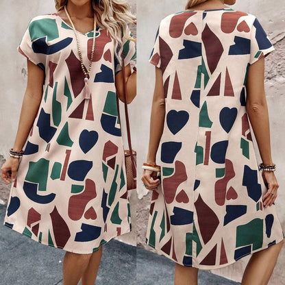 Midi Klänning med V-ringning och A-linjeform – Bekväm Polyester för Avslappnade och Festliga Tillfällen 2