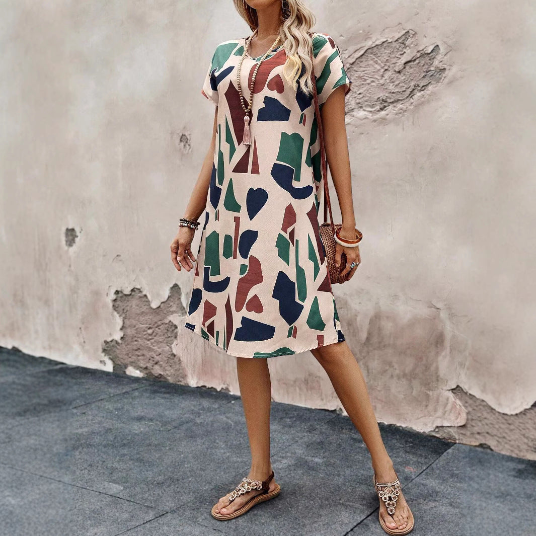 Midi Klänning med V-ringning och A-linjeform – Bekväm Polyester för Avslappnade och Festliga Tillfällen 4