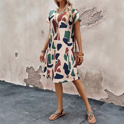 Midi Klänning med V-ringning och A-linjeform – Bekväm Polyester för Avslappnade och Festliga Tillfällen 4