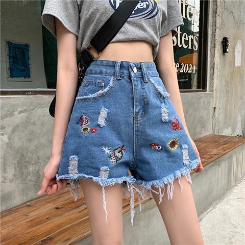 Hög Midja Denim Damshorts med Löst Snitt och Unik Lapptäckedesign – Bekväm och Trendig för Sommaren 9