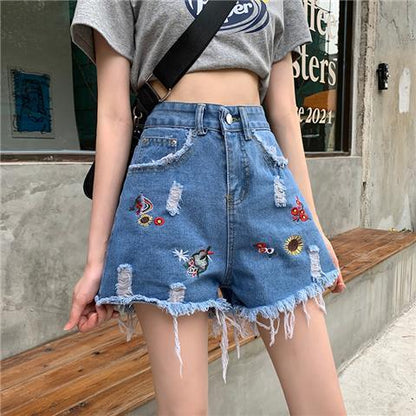 Hög Midja Denim Damshorts med Löst Snitt och Unik Lapptäckedesign – Bekväm och Trendig för Sommaren 9