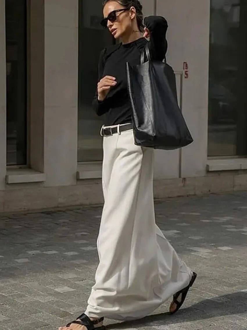 A-linjeformad Kjol för Dam i Spandex och Polyester – Lätt och Stretchig Passform, Monokrom Design, Perfekt för Vardag och Fest 3