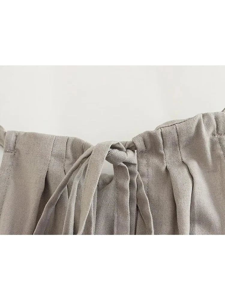 Monokrom Linnedräkt för Damer – Elegant Byxuppsättning med Reflekterande Detaljer och Elastisk Passform 2