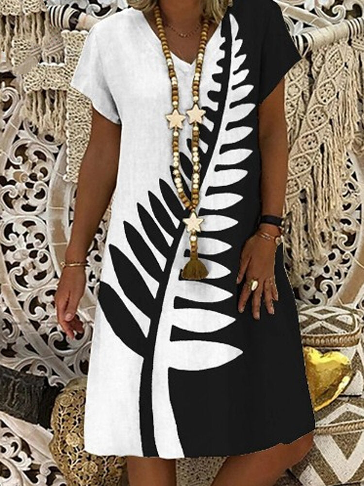 Kvinnors Mini Klänning V-ringning Blommönster Polyester 8