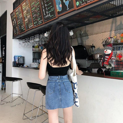 Kvinnors Minikjol i Denim med Sidofickor och Tight Passform 3