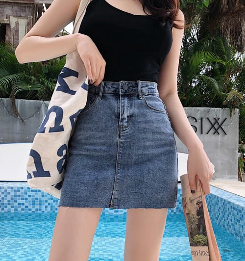 Kvinnors Minikjol i Denim med Sidofickor och Tight Passform 1